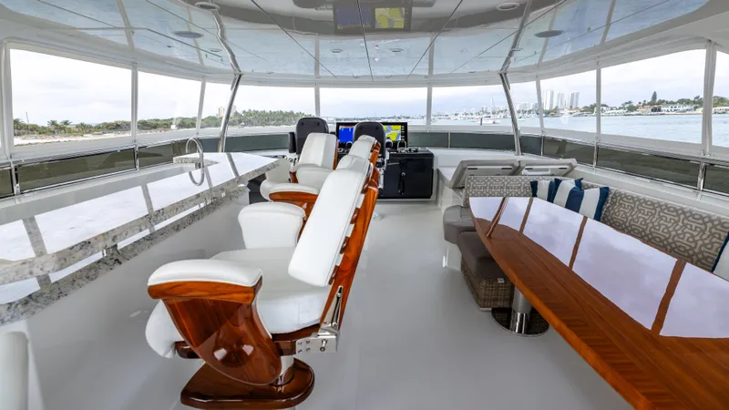 Slide: The Image of Luxurious interior of 2018 Ocean Alexander 85 E yacht with elegant seating and panoramic windows. - 40