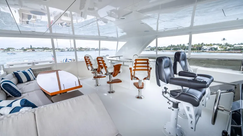 Slide: The Image of Luxurious interior of 2018 Ocean Alexander 85 E yacht with plush seating and panoramic windows. - 43