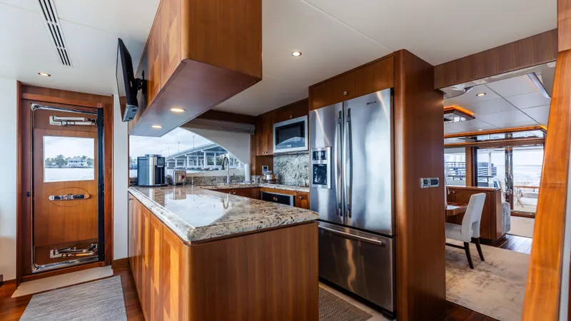 Slide: The Image of Luxurious kitchen interior of 2018 Ocean Alexander 85 E yacht with modern appliances. - 45