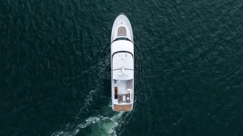 Slide: The Image of Aerial view of 2018 Ocean Alexander 85 E yacht cruising on open water. - 9