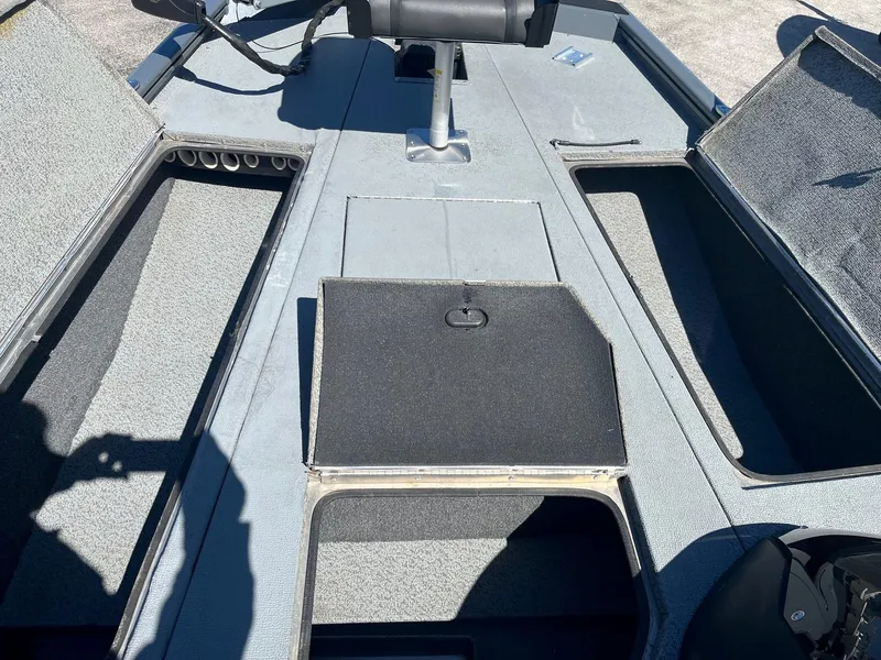 Slide: The Image of 2020 Lund 1875 Predator boat interior with open storage compartments. - 8