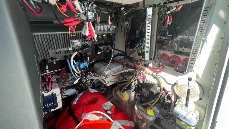 Slide: The Image of Electrical and mechanical components inside a 2005 Contender 36 Open boat. - 21