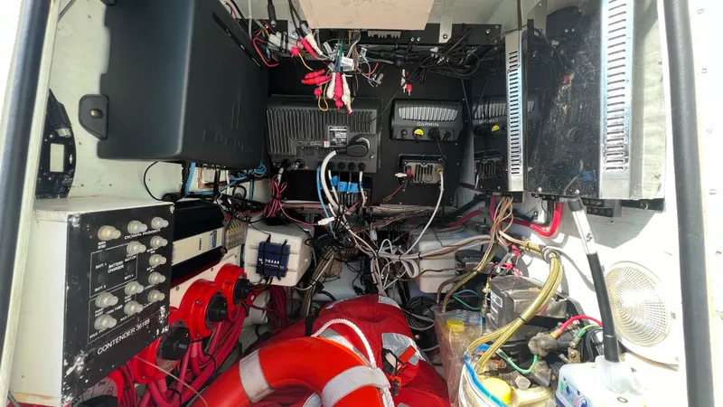 Slide: The Image of 2005 Contender 36 Open boat electrical and mechanical system compartment. - 22