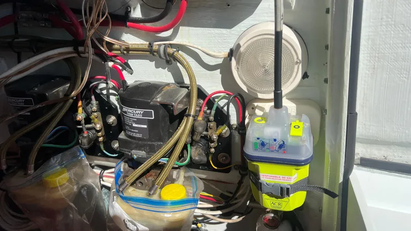 Slide: The Image of 2005 Contender 36 Open boat electrical system with wiring and components. - 23