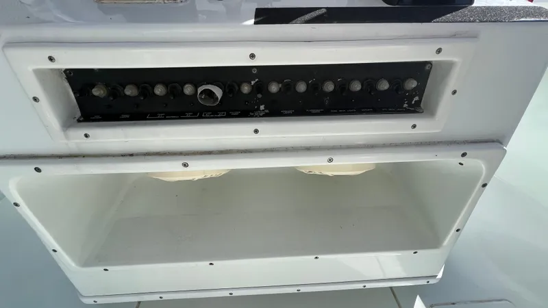 Slide: The Image of Control panel of a 2005 Contender 36 Open boat. - 25