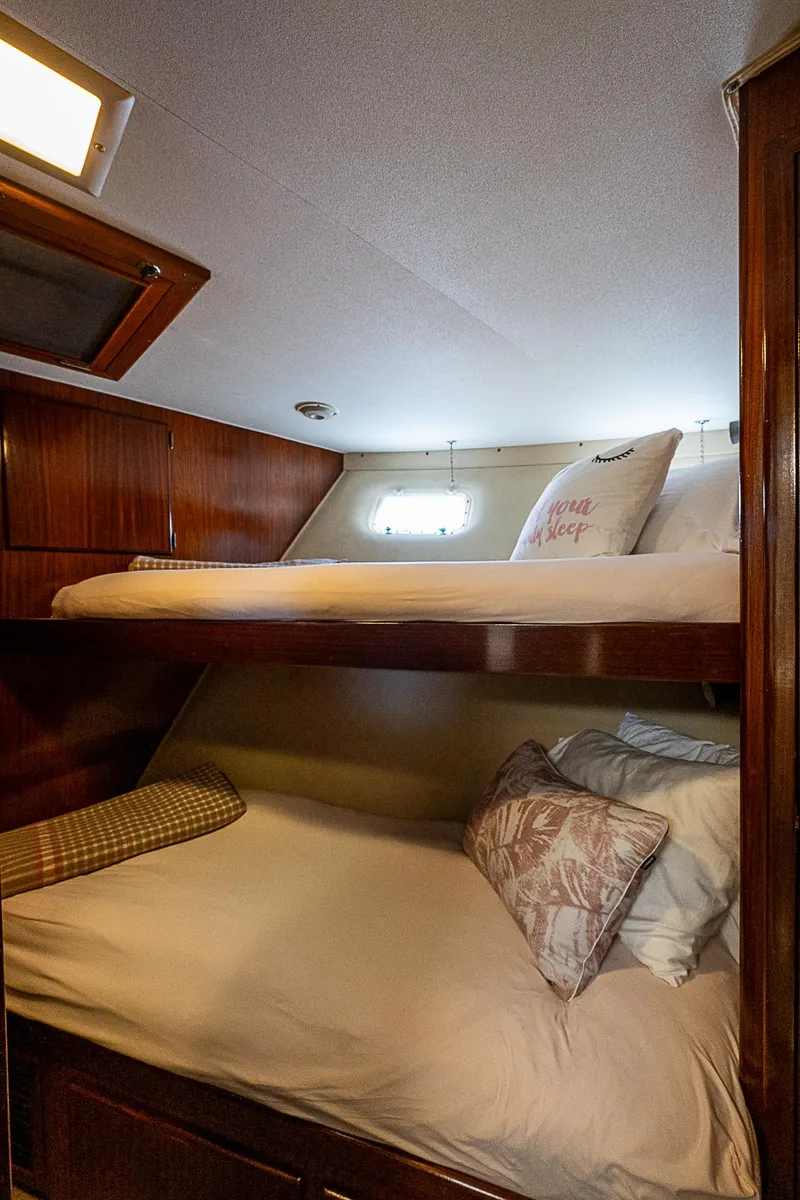 Slide: The Image of Cozy bunk beds in 1986 Hatteras 72 Motor Yacht cabin. - 35