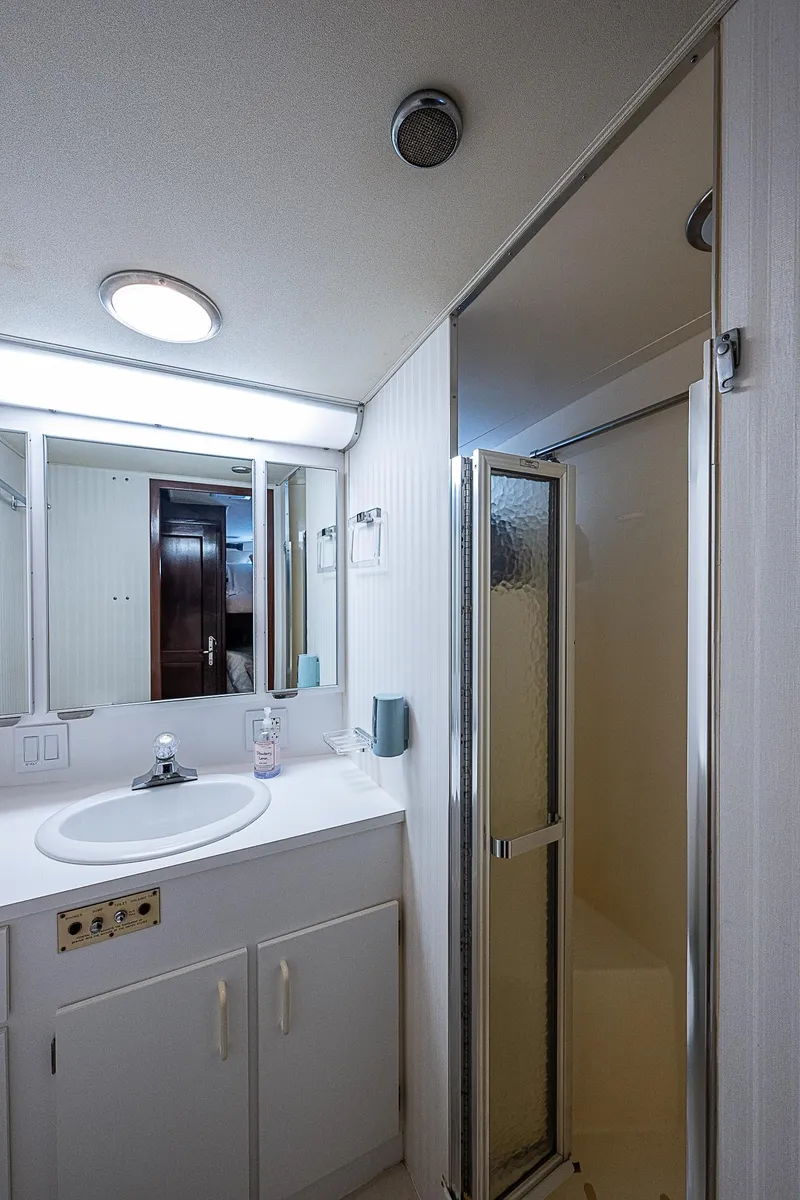 Slide: The Image of Bathroom interior of 1986 Hatteras 72 Motor Yacht with shower and vanity. - 41