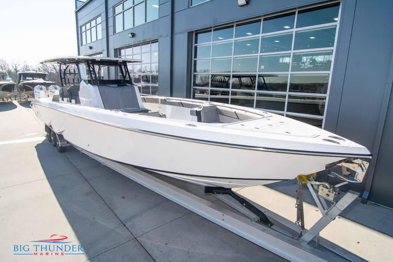 Slide: The Image of 2023 Hayaari Marine H44Z boat on trailer at Big Thunder Marine dealership. - 2