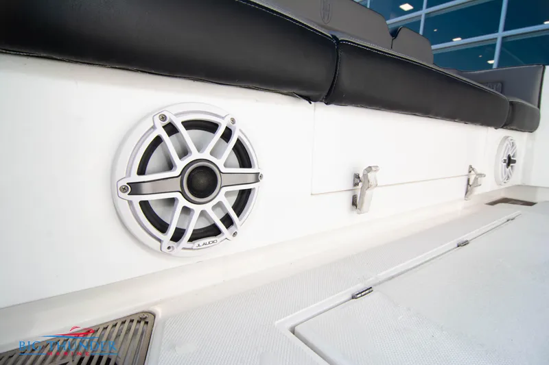 Slide: The Image of Hayaari Marine H44Z 2023 boat interior with speaker and cushioned seating. - 21