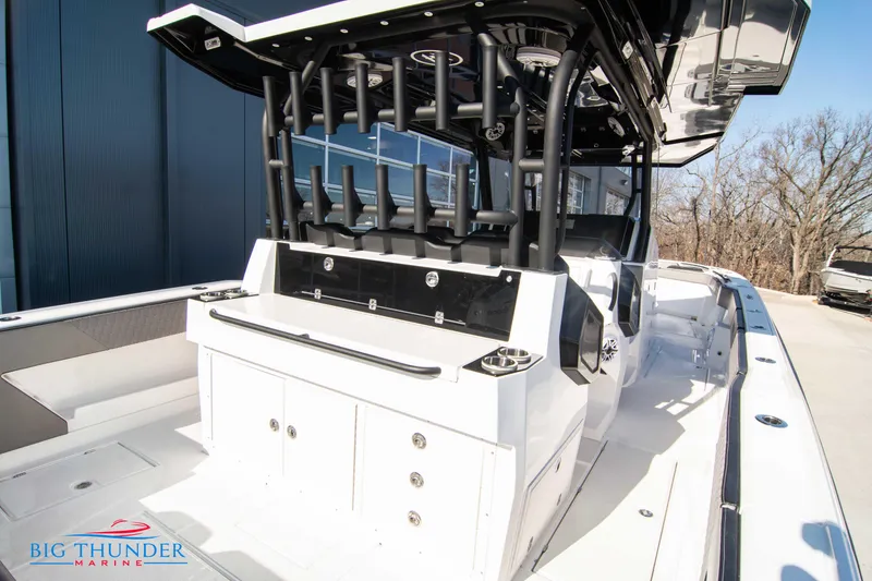Slide: The Image of 2023 Hayaari Marine H44Z boat with rod holders and storage compartments. - 24