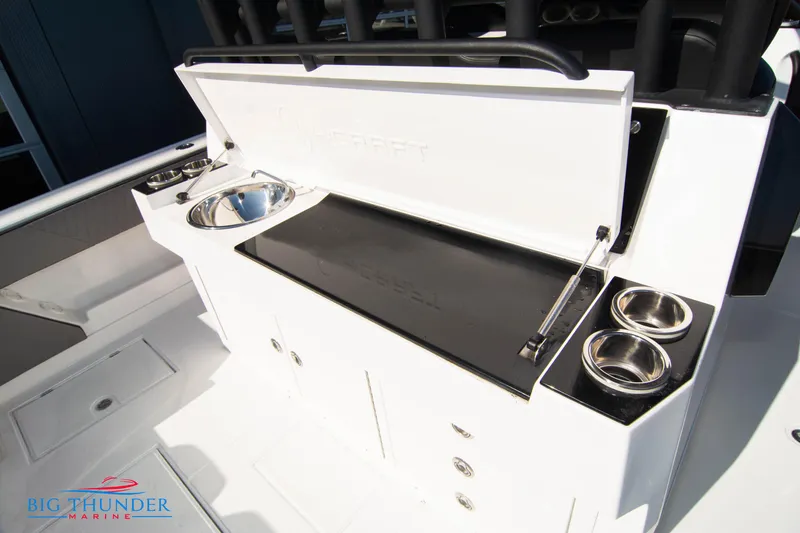 Slide: The Image of Hayaari Marine H44Z 2023 model boat with a sleek white console and storage compartments. - 27
