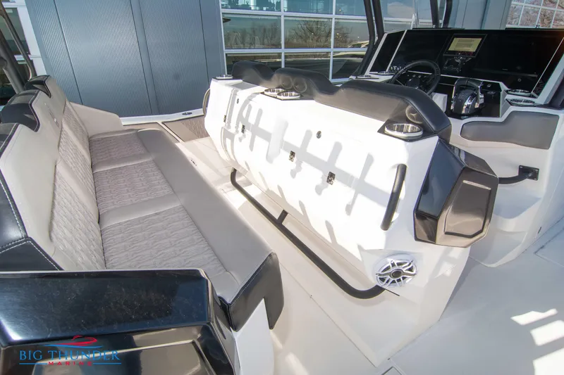 Slide: The Image of Interior of 2023 Hayaari Marine H44Z boat with seating and control console. - 31