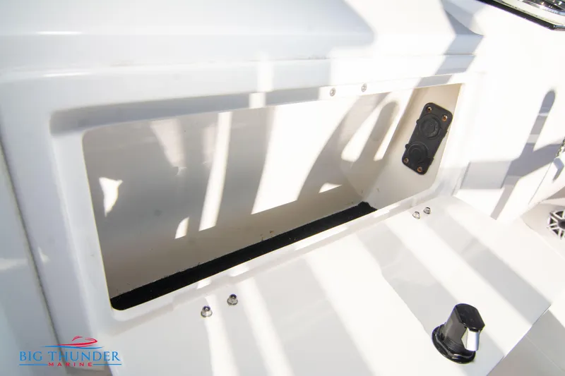 Slide: The Image of Hayaari Marine H44Z 2023 model storage compartment with power outlet. - 34