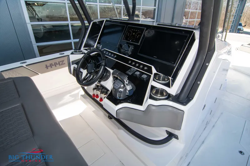 Slide: The Image of 2023 Hayaari Marine H44Z boat dashboard with advanced controls and navigation systems. - 43