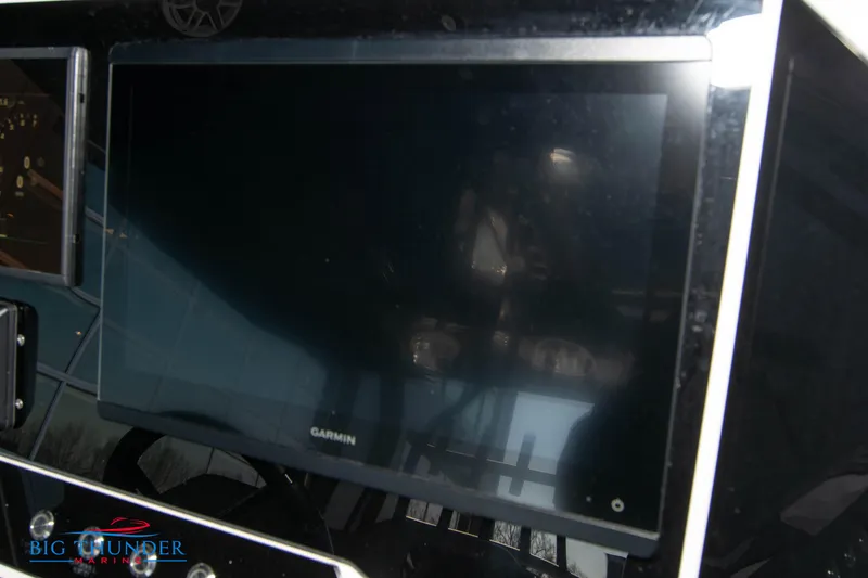 Slide: The Image of Garmin display on 2023 Hayaari Marine H44Z boat dashboard. - 46