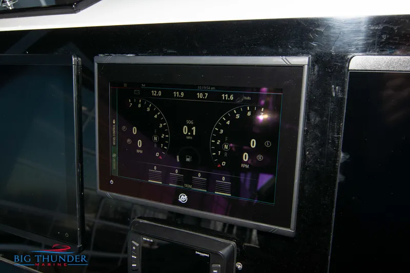 Slide: The Image of Hayaari Marine H44Z 2023 dashboard display with digital gauges and controls. - 47