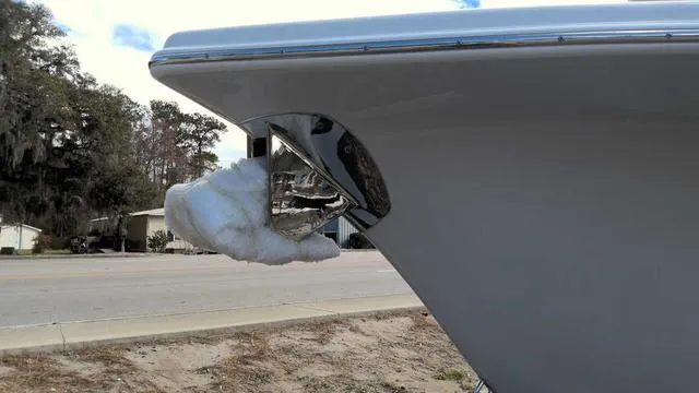 Slide: The Image of 2024 Sea Pro 262 Sport boat bow with anchor and chrome detailing. - 2