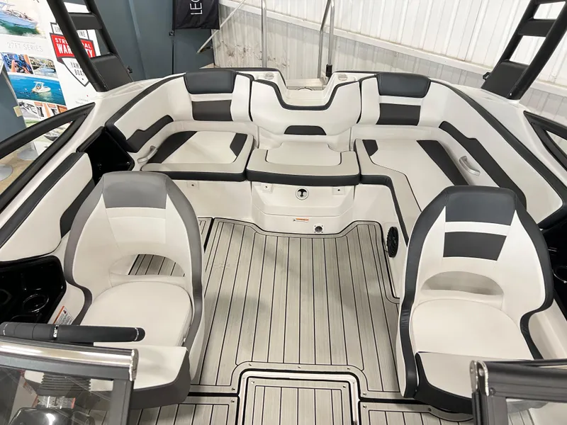 Slide: The Image of 2024 Yamaha Boats 195 S interior with spacious seating and modern design. - 3