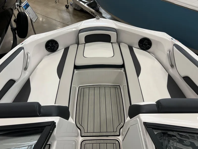 Slide: The Image of 2024 Yamaha Boats 195 S interior seating and deck area. - 5