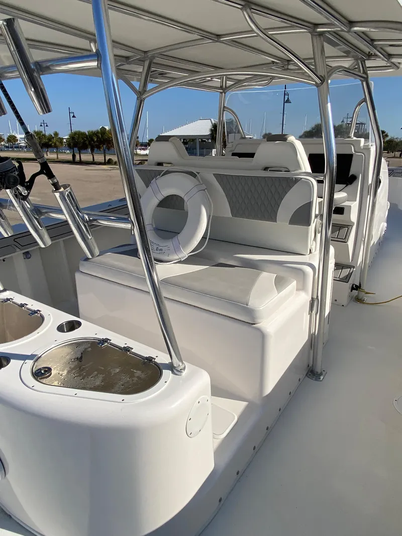 Slide: The Image of 2021 Twin Vee 36 Center Console boat with sleek seating and modern design. - 13