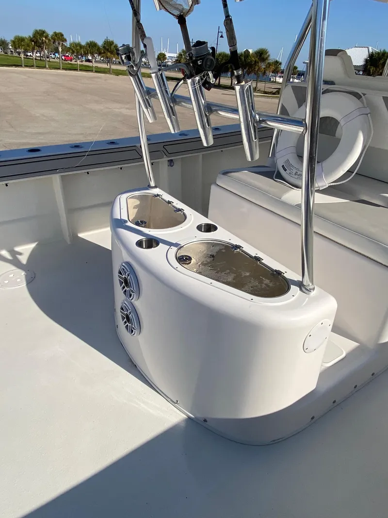 Slide: The Image of 2021 Twin Vee 36 Center Console boat interior with rod holders and seating. - 18