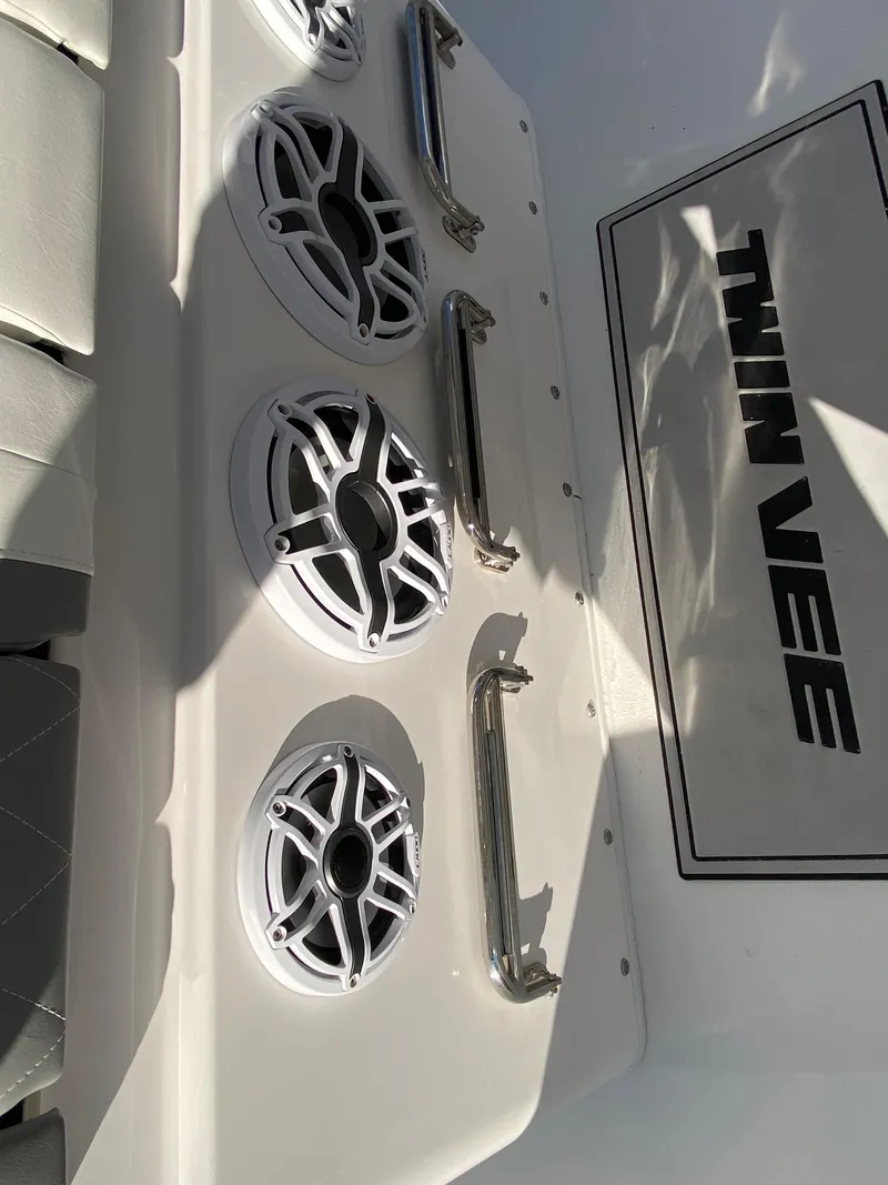 Slide: The Image of 2021 Twin Vee 36 Center Console boat speakers and handles detail. - 19