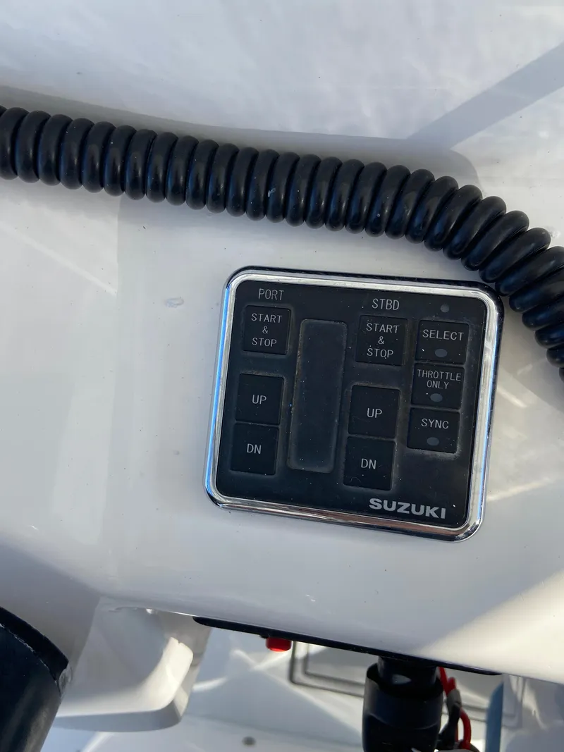 Slide: The Image of Control panel of a 2021 Twin Vee 36 Center Console boat. - 27