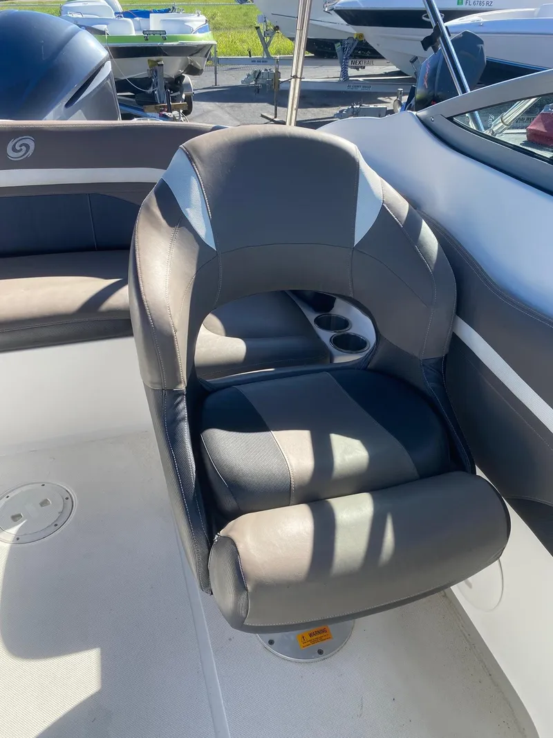Slide: The Image of Captain's chair on a 2017 Hurricane SunDeck 2200 DC OB boat. - 13