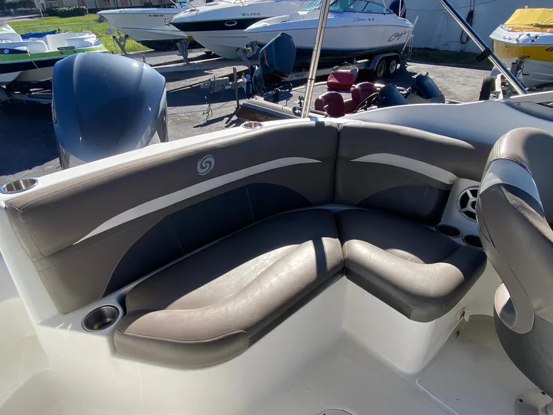 Slide: The Image of 2017 Hurricane SunDeck 2200 DC OB boat with comfortable seating area. - 14