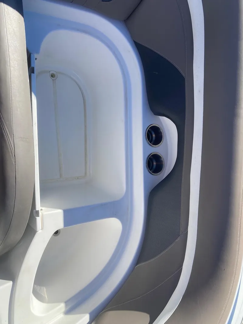 Slide: The Image of 2017 Hurricane SunDeck 2200 DC OB boat interior detail with cup holders. - 20
