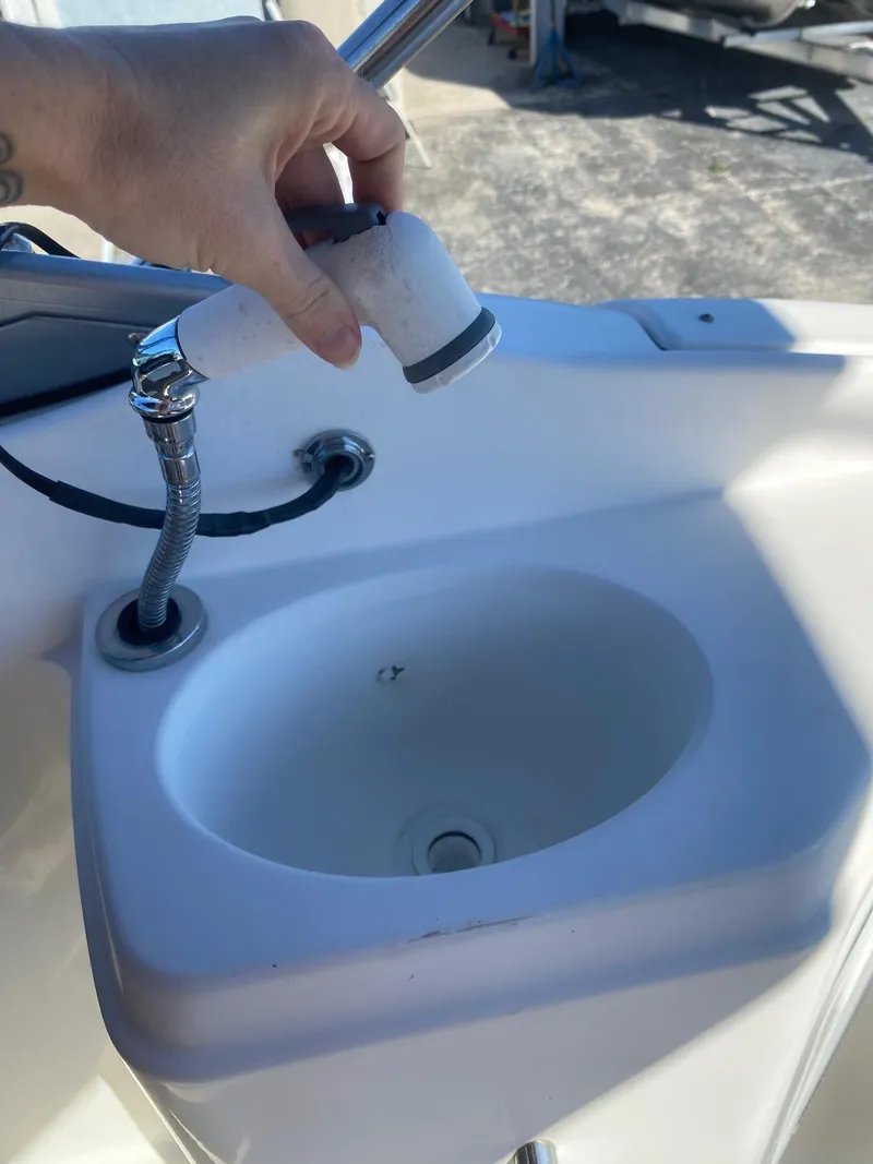 Slide: The Image of 2017 Hurricane SunDeck 2200 DC OB boat sink and faucet - 28