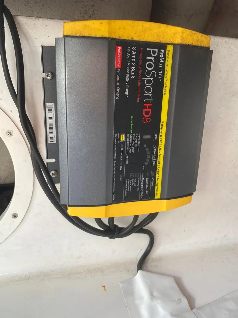 Slide: The Image of Battery charger on a 2017 Hurricane SunDeck 2200 DC OB boat. - 32