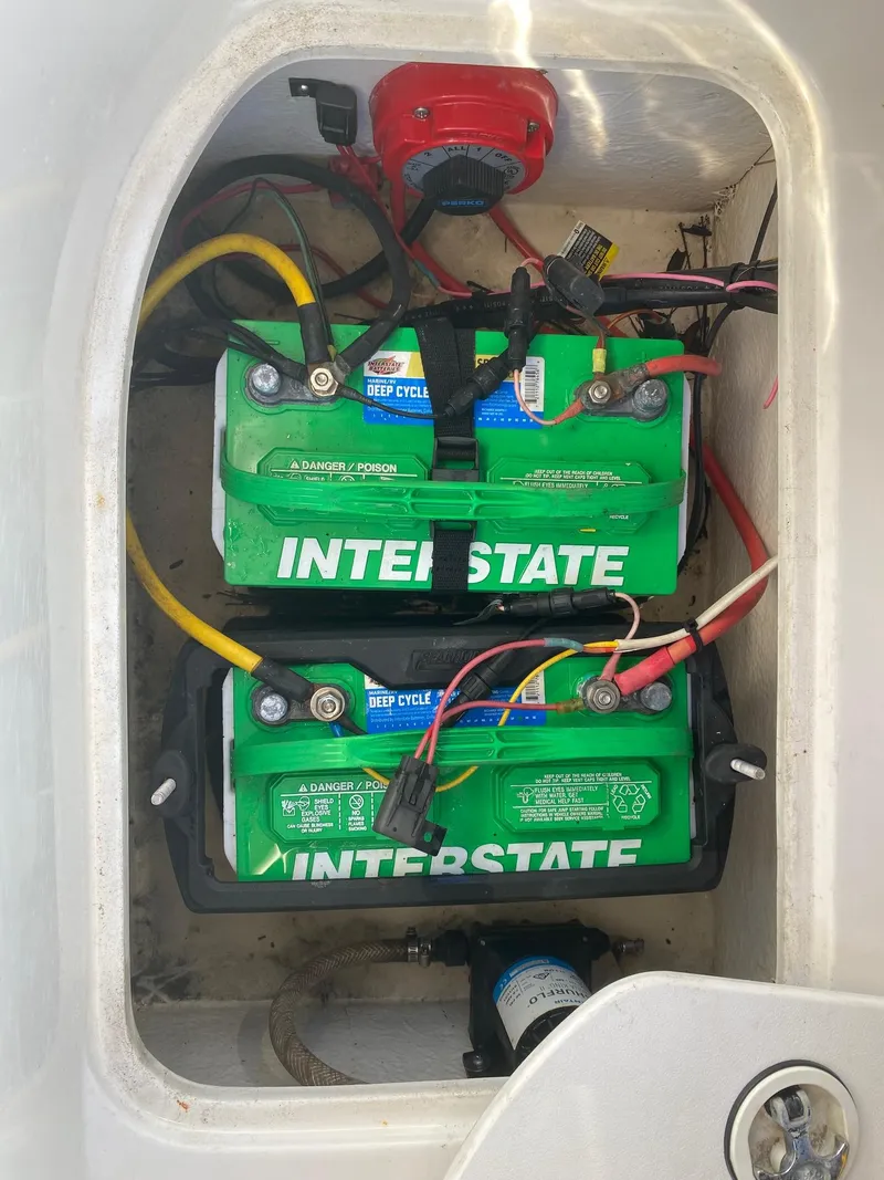 Slide: The Image of 2017 Hurricane SunDeck 2200 DC OB boat battery compartment with Interstate deep cycle batteries. - 33