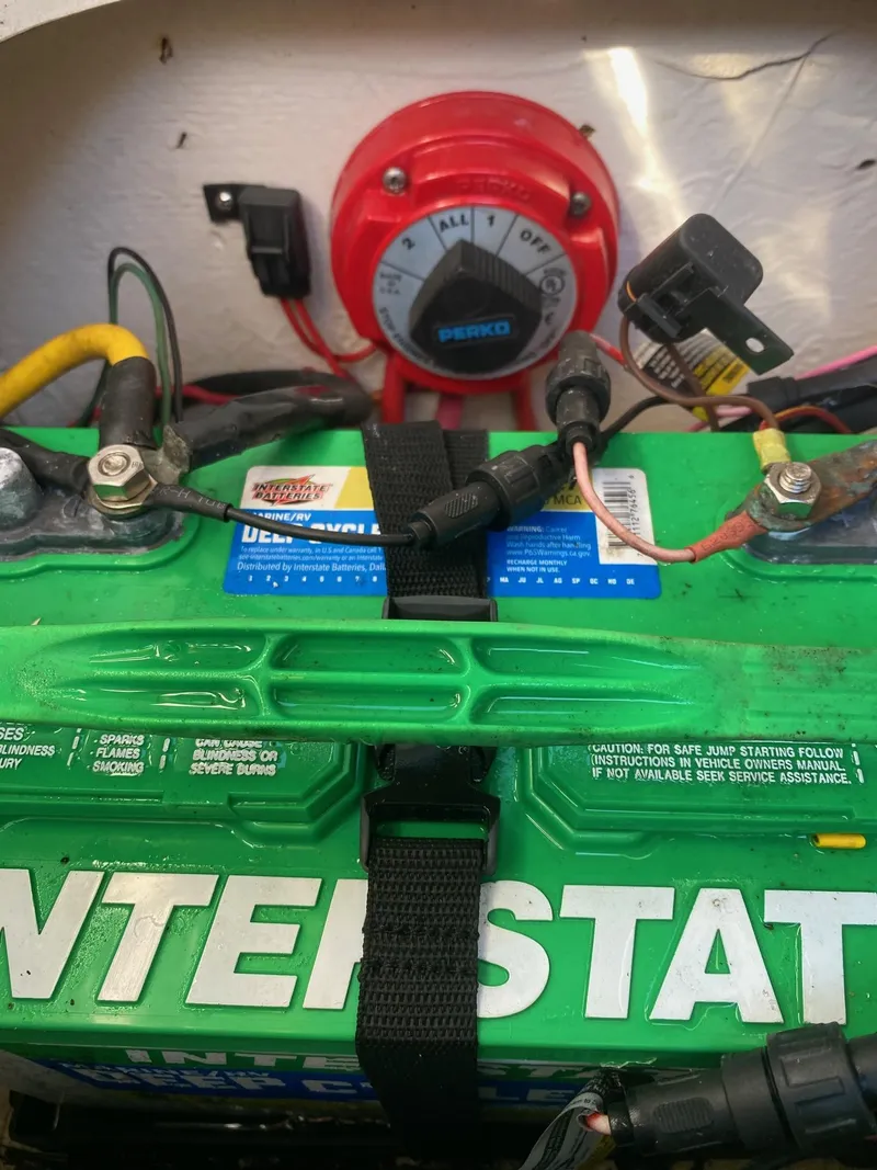 Slide: The Image of 2017 Hurricane SunDeck 2200 DC OB boat battery and Perko switch. - 34