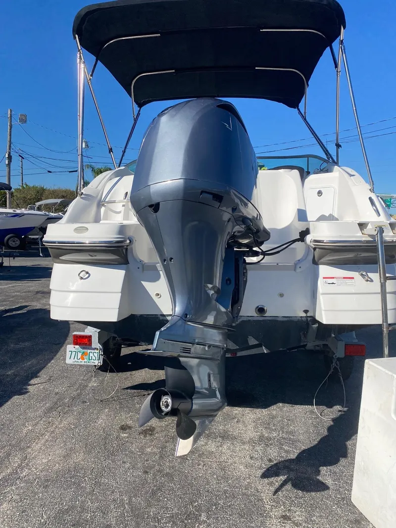 Slide: The Image of 2017 Hurricane SunDeck 2200 DC OB boat with outboard motor and canopy. - 36