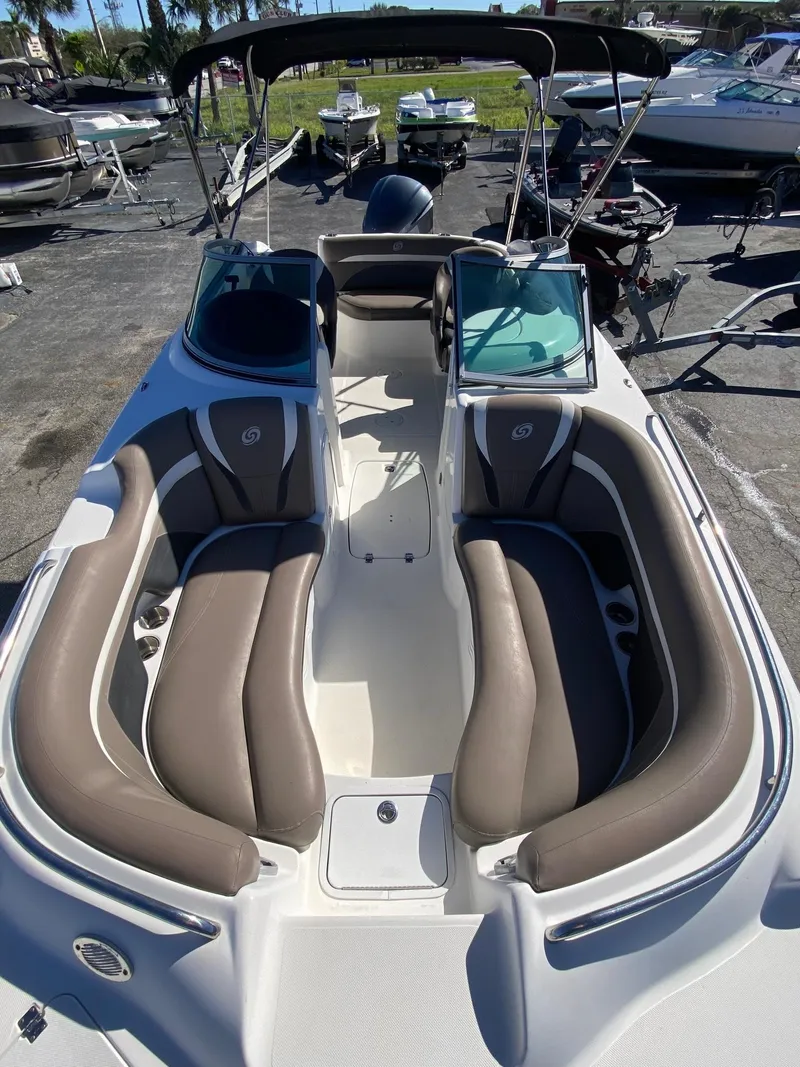Slide: The Image of 2017 Hurricane SunDeck 2200 DC OB boat with spacious seating and modern design. - 6
