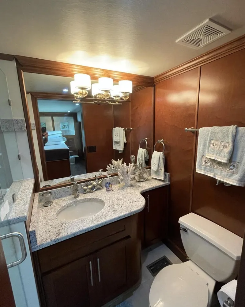 Slide: The Image of Modern bathroom in a 2015 Stardust Cruisers 20' x 106' houseboat. - 12