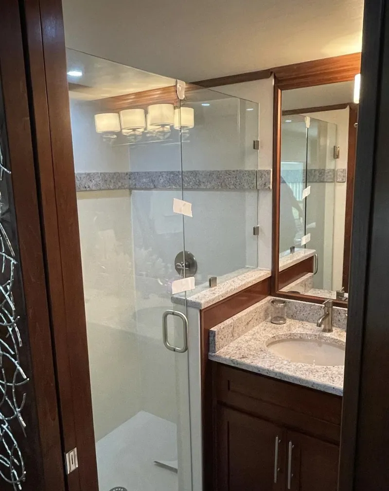Slide: The Image of Modern bathroom in 2015 Stardust Cruisers 20' x 106' houseboat. - 13