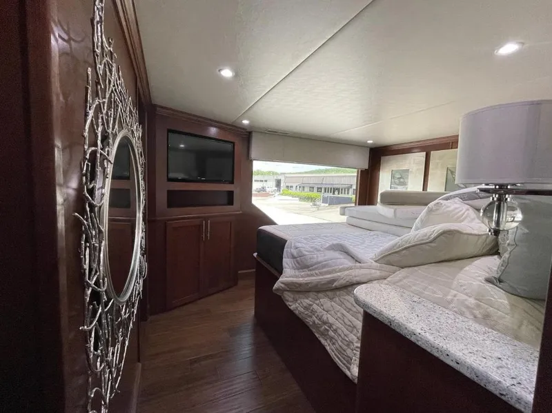 Slide: The Image of Luxurious bedroom interior of 2015 Stardust Cruisers 20' x 106' houseboat with modern decor. - 19