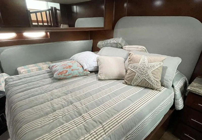 Slide: The Image of Luxurious bedroom in a 2015 Stardust Cruisers 20' x 106' houseboat. - 20