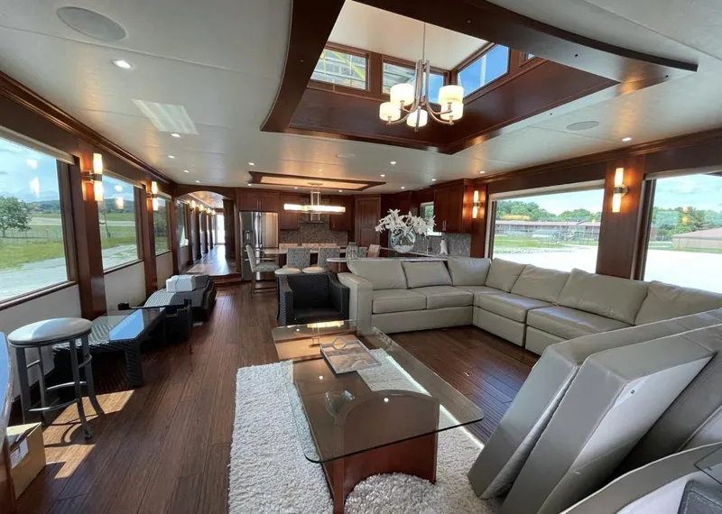 Slide: The Image of Luxurious interior of 2015 Stardust Cruisers 20' x 106' houseboat with modern furnishings. - 24