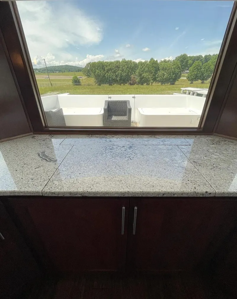 Slide: The Image of Granite countertop with outdoor view on 2015 Stardust Cruisers 20' x 106' houseboat. - 4