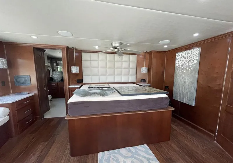 Slide: The Image of Luxurious bedroom interior of 2015 Stardust Cruisers 20' x 106' houseboat. - 8