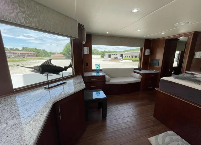 Slide: The Image of Luxurious interior of 2015 Stardust Cruisers 20' x 106' houseboat with modern furnishings. - 9