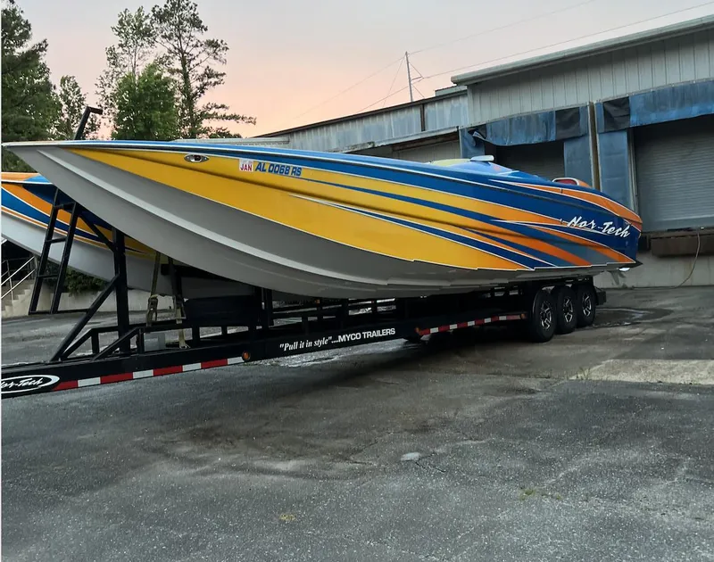 The Image of 2007 Nor-Tech 3600 Supercat powerboat on a trailer. - 1