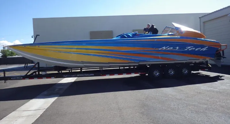 Slide: The Image of 2007 Nor-Tech 3600 Supercat speedboat on a trailer. - 3
