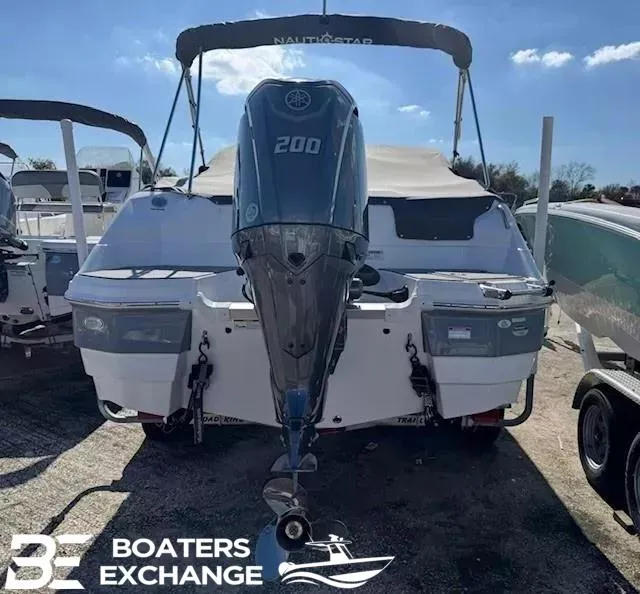 Slide: The Image of 2024 NauticStar 223 DC boat with Yamaha 200 engine at Boaters Exchange. - 2