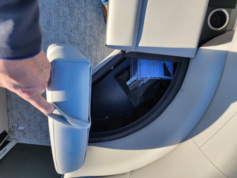 Slide: The Image of Storage compartment in 2024 Trifecta 24RF LE 2 75 boat with trailer. - 13