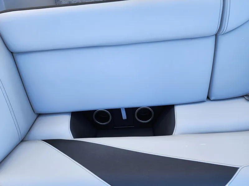 Slide: The Image of 2024 Trifecta 24RF LE 2 75 boat seat with built-in cup holders. - 14