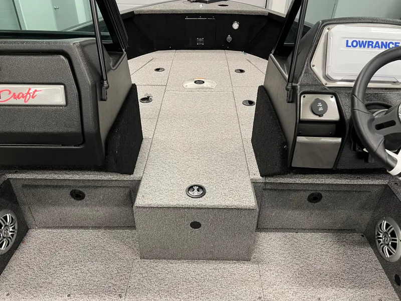 Slide: The Image of 2023 Alumacraft Competitor 175 Sport interior with Lowrance electronics and spacious deck. - 11